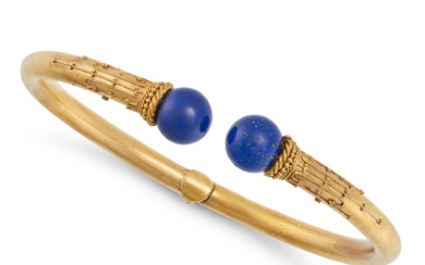 AN ANTIQUE LAPIS LAZULI BANGLE in yellow gold, the ...
