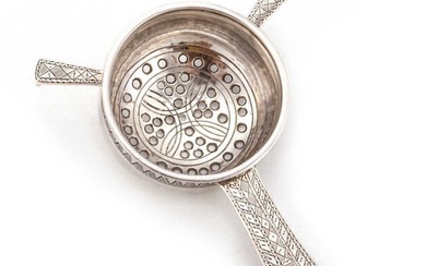 AN ARTS AND CRAFTS SILVER TEA STRAINER