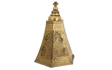 AN ENGRAVED AND OPENWORK BRASS MAMLUK HANGING LANTERN Egypt or Syria, 14th - 15th century, the underside with two 19th-century-replaced metal bordering frames
