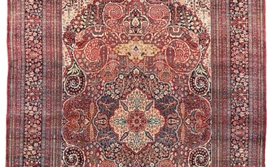 AN INSCRIBED AND DATED MASHAD CARPET, NORTHEAST PERSIA