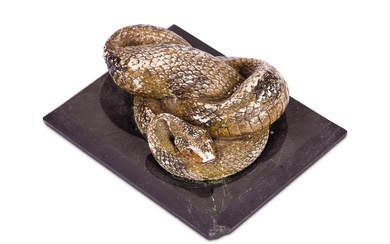 AN ITALIAN PAINTED MARBLE CARVING OF A COILED SNAKE, 19TH CENTURY