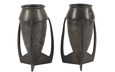 ARCHIBALD KNOX (BRITISH 1864-1933) FOR LIBERTY & CO, A PAIR OF TUDRIC PEWTER TORPEDO VASES