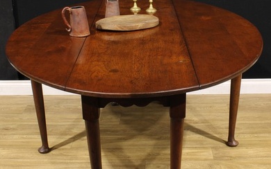 An 18th century style oak Irish wake table, oval top with fa...