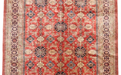 An Afghan rug, classic Afshan design with geometrical repeating pattern on red...