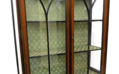 An Edwardian mahogany and boxwood strung display cabinet, with...