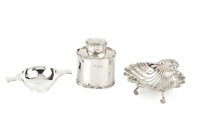 An Edwardian silver oval tea caddy and cover, with scroll...