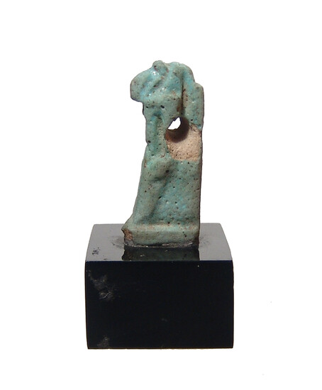 An Egyptian faience amulet of Thoth, Ptolemaic