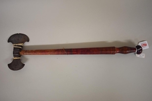 An Indo Persian battle axe, having painted wood handle, firs...