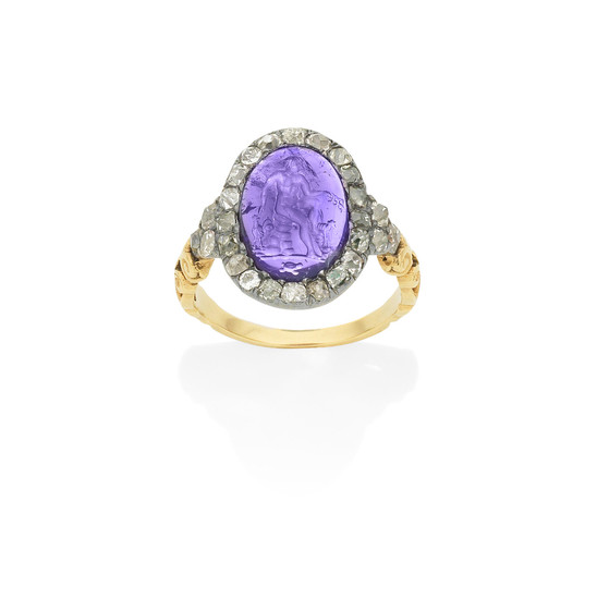 An antique amethyst intaglio and diamond cluster ring