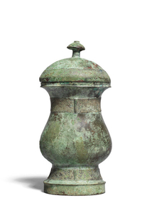 An archaic bronze wine vessel and cover, zhi