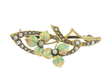An early 20th century Art Nouveau 15ct gold enamel and split pearl brooch.