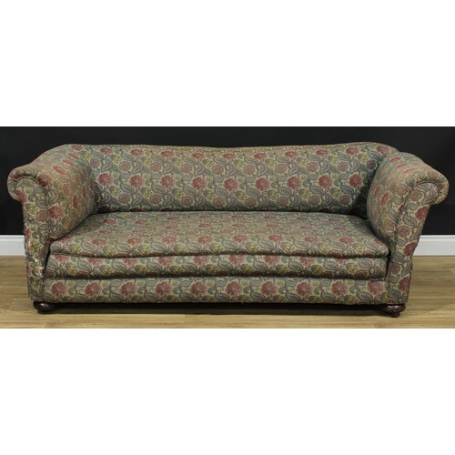 An early 20th century country house Chesterfield club sofa, ...