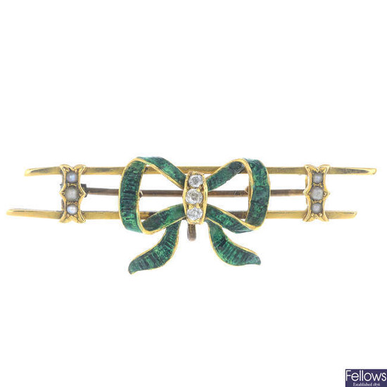 An early 20th century gold gem-set bow brooch.