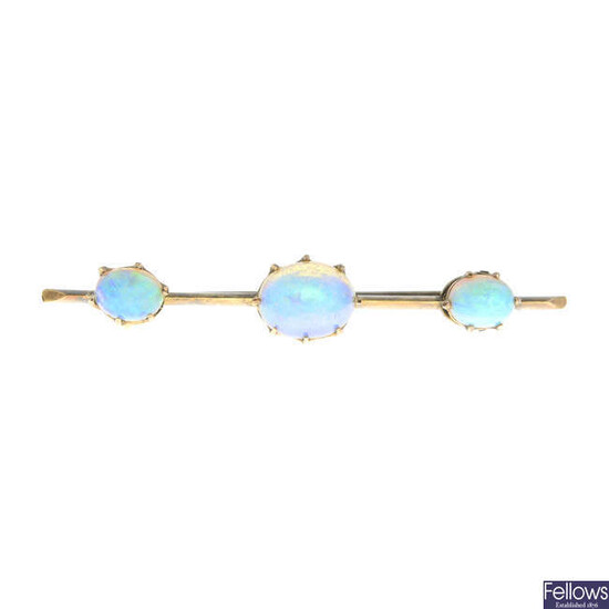 An early 20th century gold opal brooch.