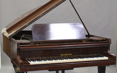 An early 20th century mahogany cased grand piano by Neumeyer, overstrung, raised on square tapering