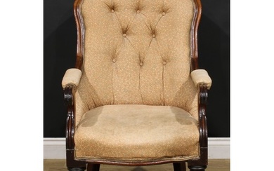 An early Victorian mahogany library chair, stuffed-over upho...