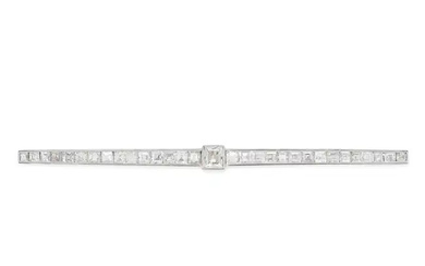 CARTIER, A DIAMOND BAR BROOCH in platinum and yell ...