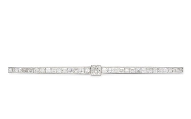 CARTIER, A DIAMOND BAR BROOCH in platinum and yellow gold, set to the centre with an old step cut...