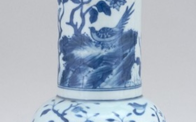 CHINESE BLUE AND WHITE PORCELAIN VASE In swallow-tail form, with decoration of a bird in a landscape. Six-character Qianlong mark on...