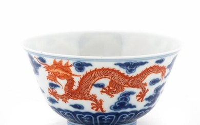 CHINESE BLUE & WHITE CUP WITH IRON-RED DRAGONS