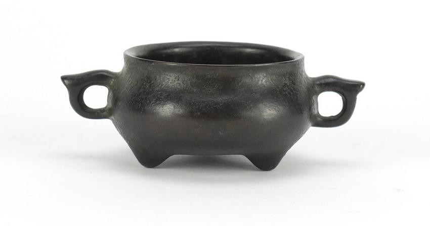 Chinese bronze tripod censer with twin handles