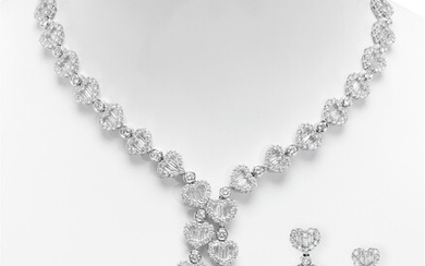 Set of necklace and pair of earrings in 18 kt white gold