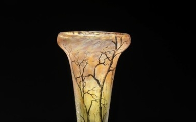 Daum Nancy: A etched and enameled vase of clear, orange-rose and yellow glass. H. 25.5 cm.