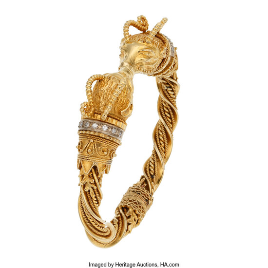 Diamond, Gold Bracelet The hinged bangle features single-cut diamonds...