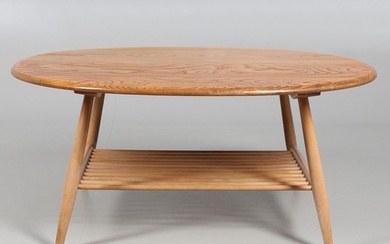ERCOL - VINTAGE LARGE VINTAGE COFFEE TABLE. A large elm and ...
