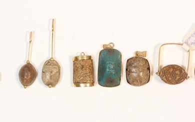 Egypt, collection of seven amulets and a ring,...