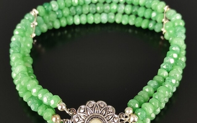 Emerald bracelet, 3-row, made of natural faceted emerald rondelles divided by silver bars, together