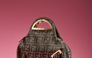 Fendi, Zucca canvas monogram bag, curling in the inferior corners, golden metal details on the edges and the handle.