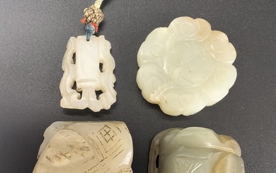Four Chinese Carved Jade Pendants