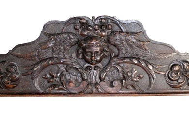 French carved oak overdoor panel with cherub mask