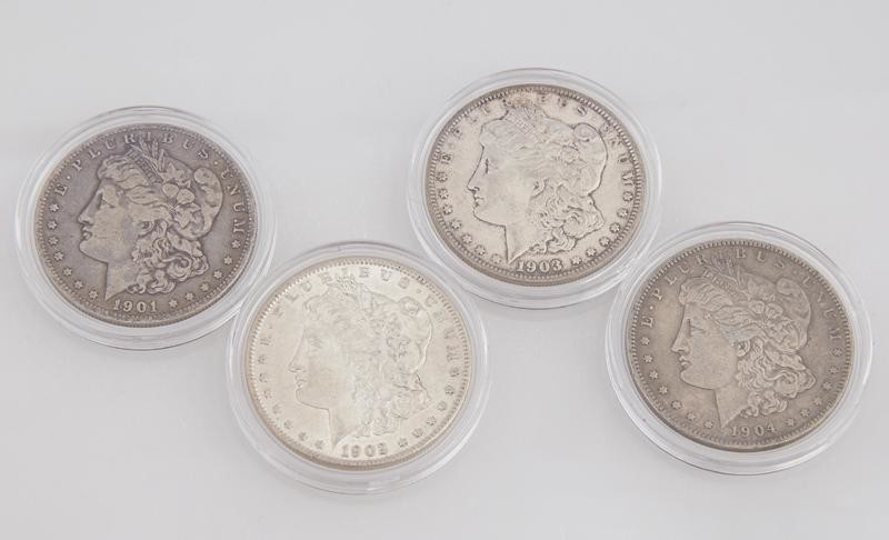 Group of Four Morgan Silver Dollars, consisting of