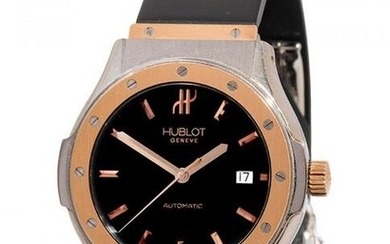 HUBLOT Automatic watch ref. 1915.7, n. 6693XX, for men/Unisex. Case in steel and yellow gold. Black