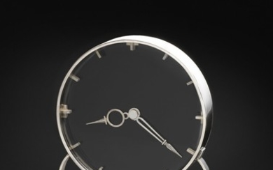 Harald Nielsen: A rare art deco sterling silver table clock. Black lacquered clock face and sterling silver numerals and hands. H. 22.8 cm.