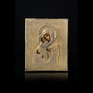 Icon depictin Madonna and child, with a golden silver riza. Russia, second-half of he 20th Century (cm 18x14.5)