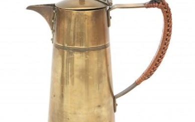 A Nieuwe Kunst brass mocca-pot, decorated with horizontal engraved lines and visible brass nails, the lid with ebony grip and the handle with raffia, circa 1910, marked with monogram underneath, dents and scratches, the hinge of the lid soldered.
