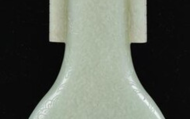 Jade vase. China. 19th century. Pale green, highly