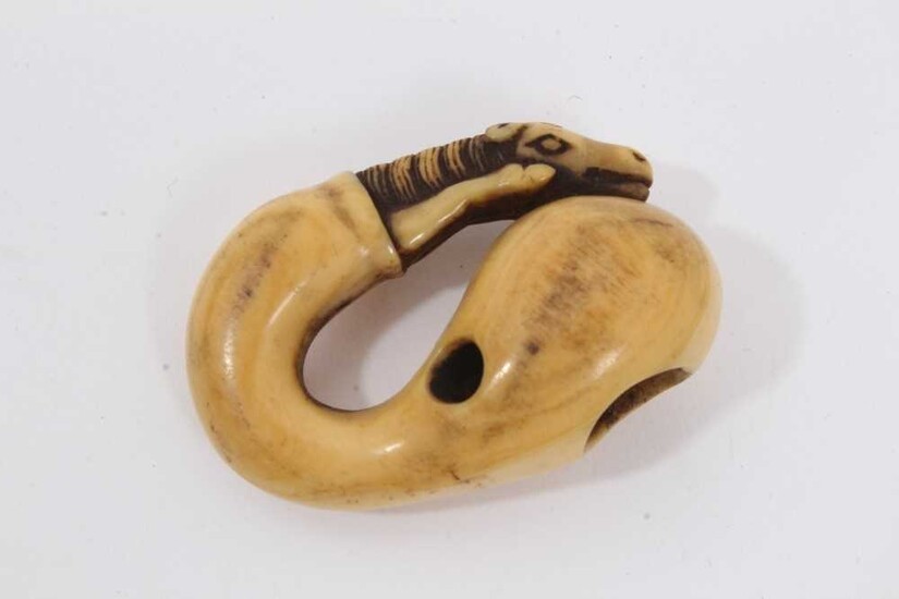 Japanese Edo period carved ivory netsuke in the form of a horse and gourd, with yellow patina