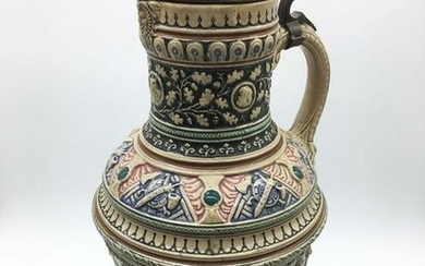Large wine jug with a bronze lid with scenes from the