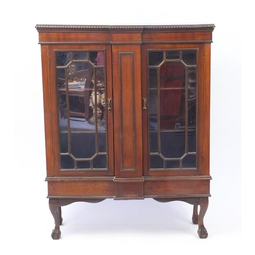 Mahogany breakfront bookcase fitted with a pair of glazed do...