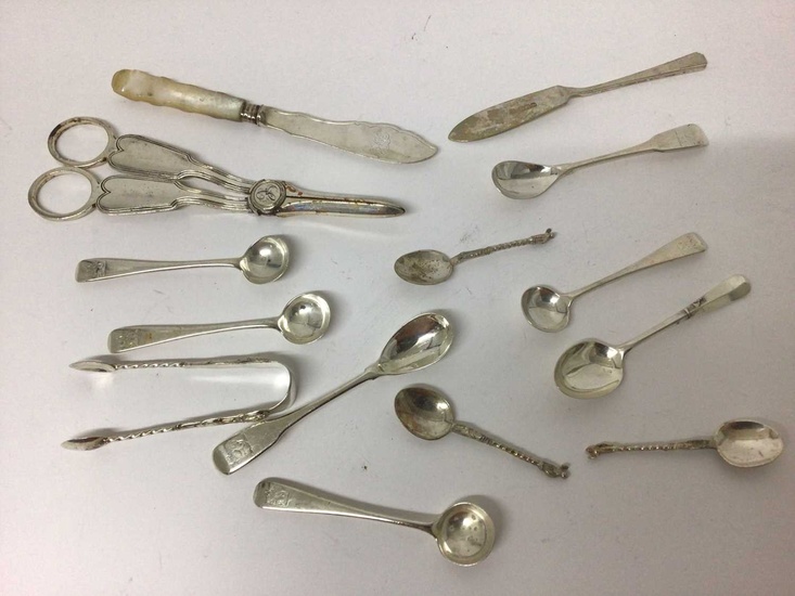 Mixed group of Georgian and later silver condiment spoons, sugar tongs, plated grape scissors and other items, weighable silver 3.6ozs