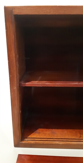 NOT SOLD. A small mahogany display cabinet with two shelves. Sliding glass doors. H. 41.5....