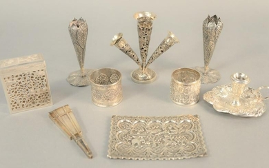 Nine-piece silver lot to include vases, candleholder
