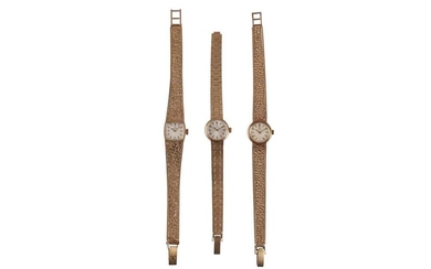 OMEGA. 3 LADIES 9K GOLD WATCHES.