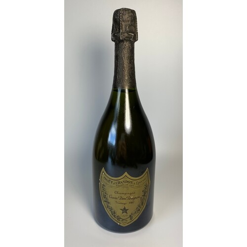 One bottle Champagne Dom Perignon Brut 1982. Ullage to appro...