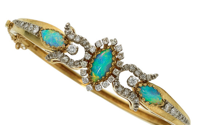 Opal, Diamond, Gold Bracelet The hinged bangle features marquise-shaped...