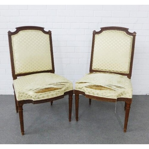 Pair of French walnut framed chairs with upholstered backs a...